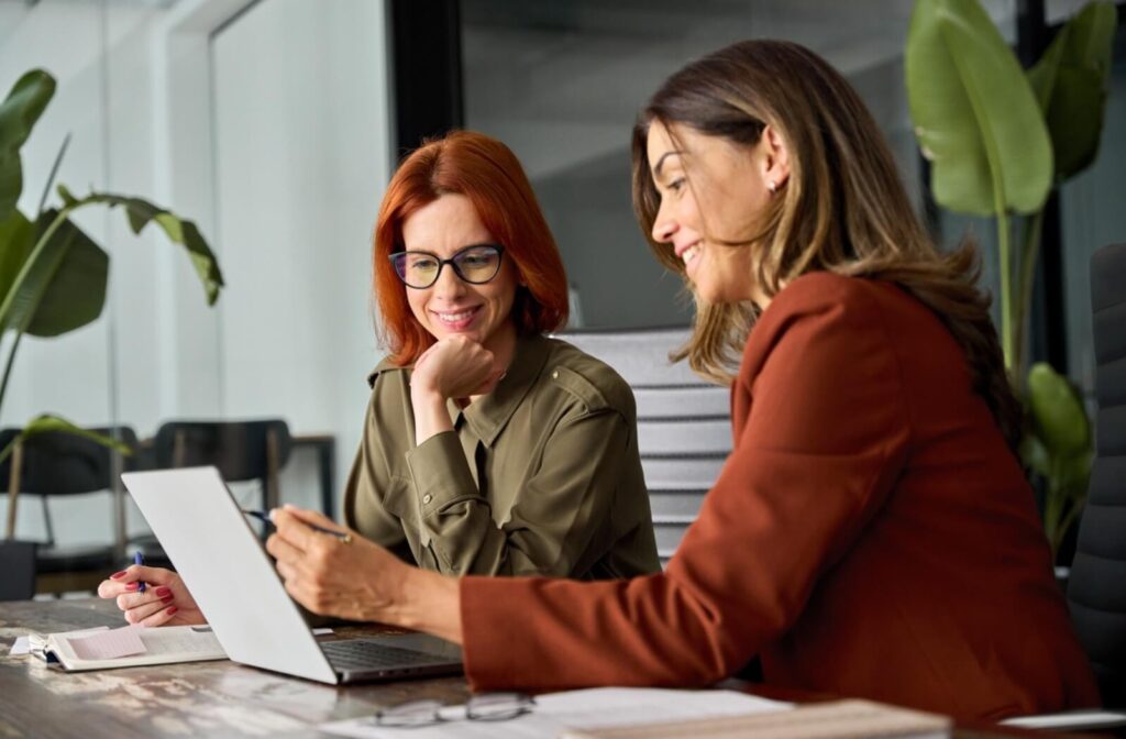 A financial professional goes over a client's debt repayment plan.